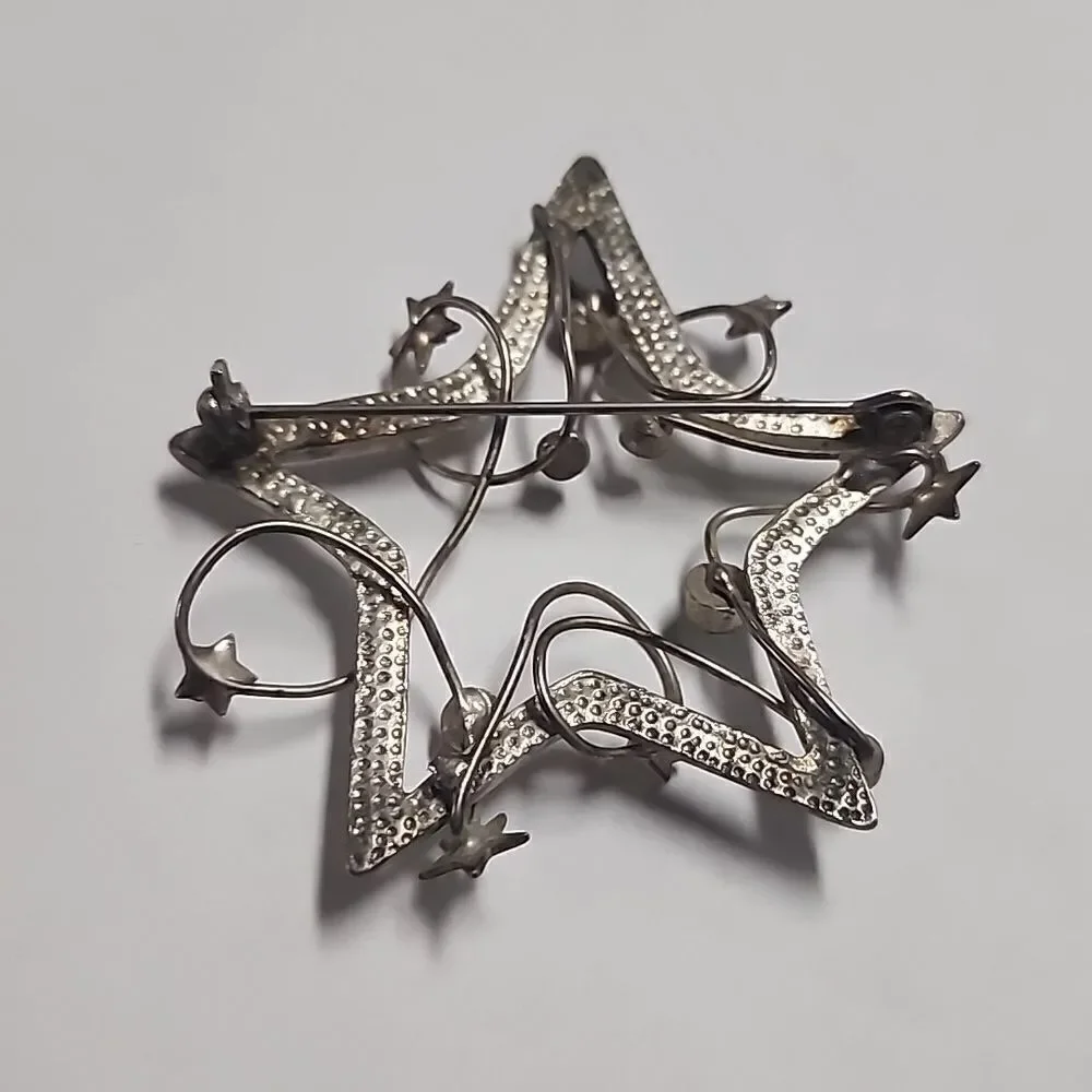 Vintage Silver Tone with Red and Green Rhinestones Star Christmas Brooch